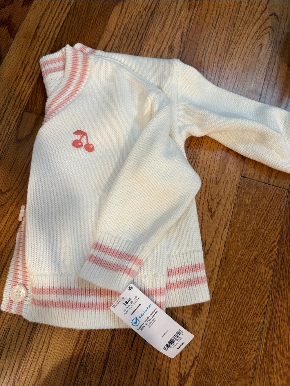 Carters size 18m. Cream and Pink Striped Knit Sweater with Cherry Accent